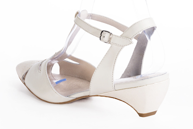 Off white women's open back T-strap shoes. Tapered toe. Low wedge heels. Rear view - Florence KOOIJMAN